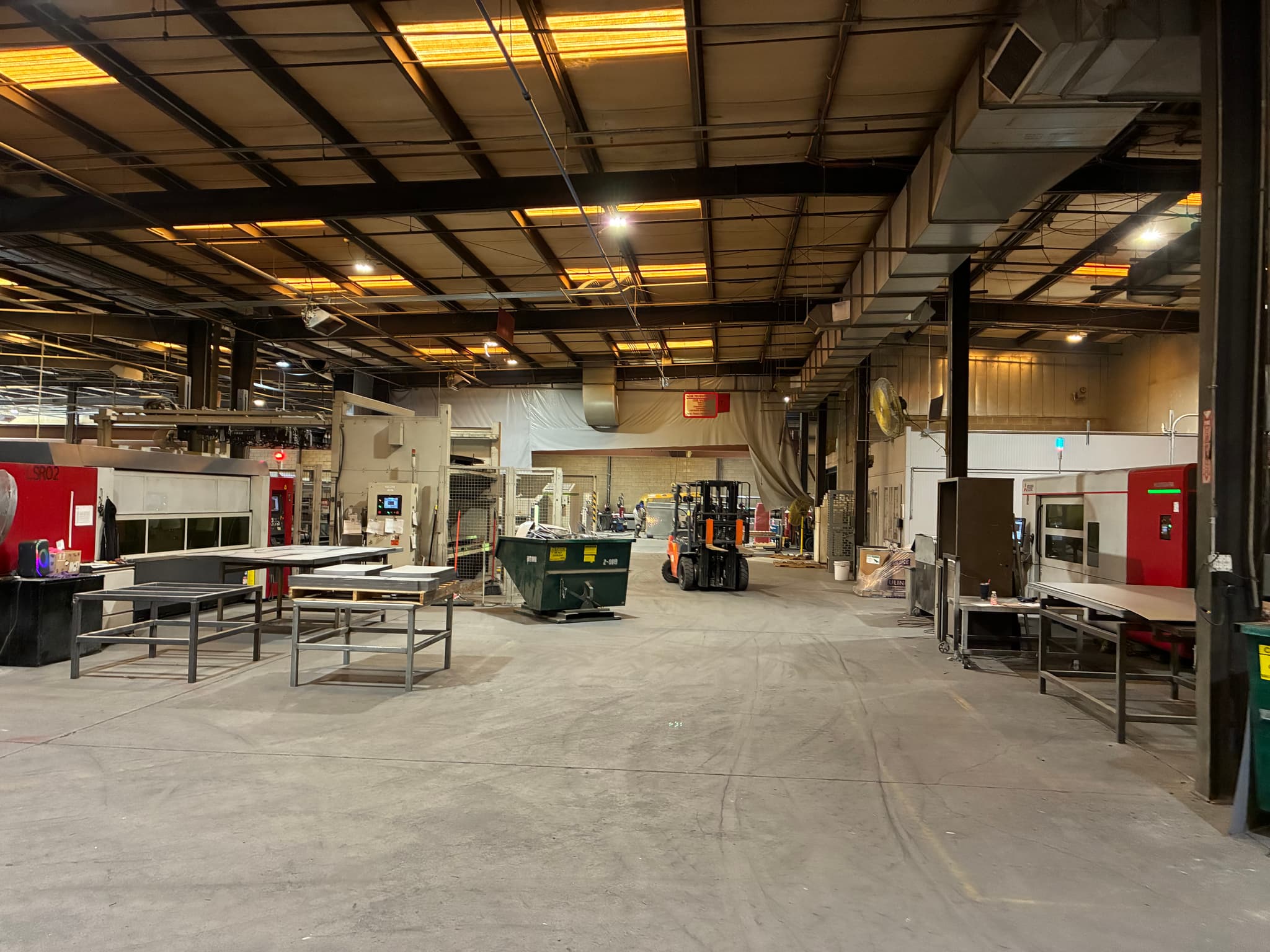 Industrial warehouse with warm orange HID lighting